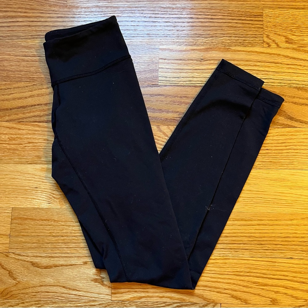 Lululemon black reversible leggings size 4